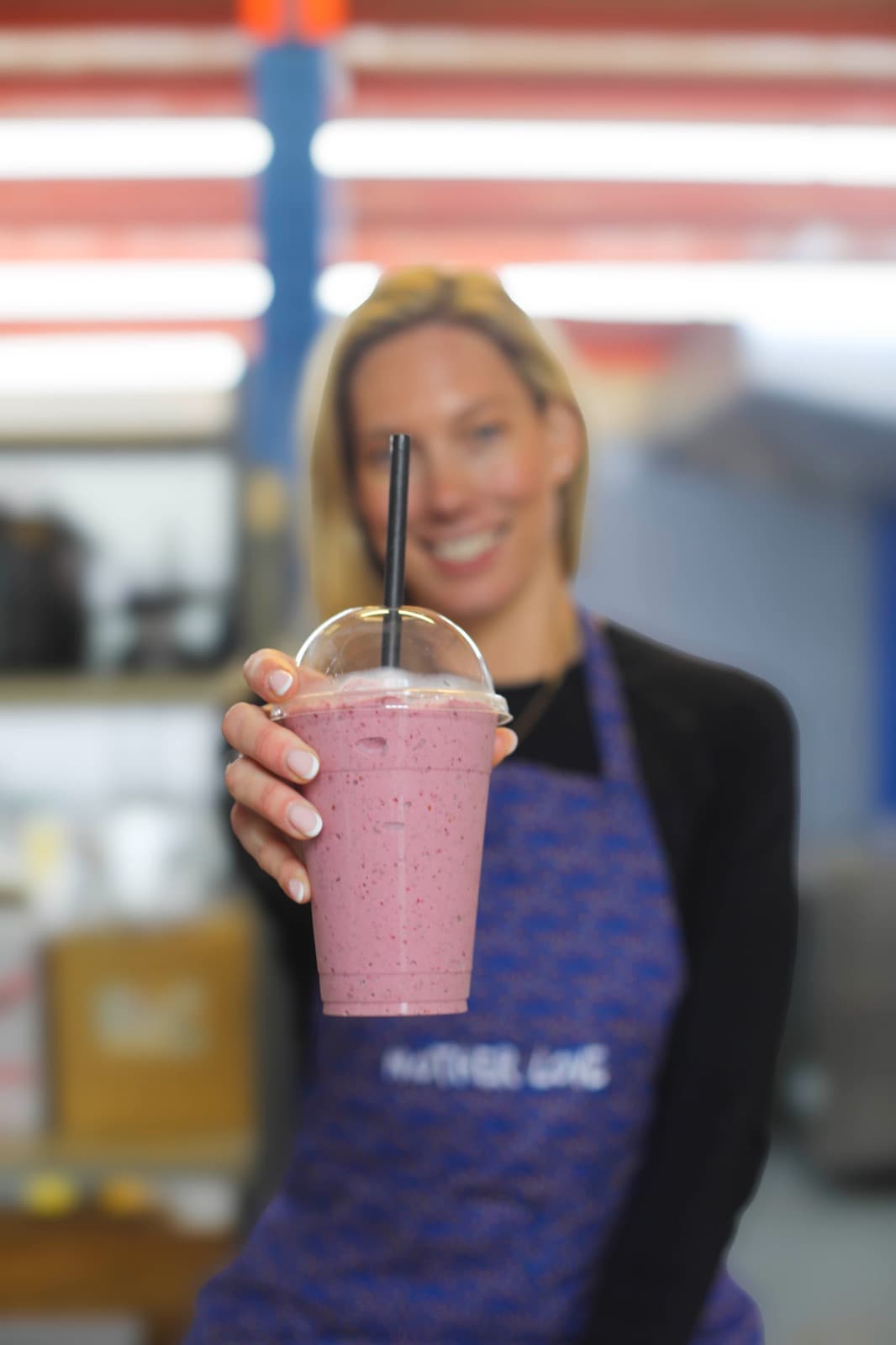 Tamaryn Small holding a freshly made smoothie