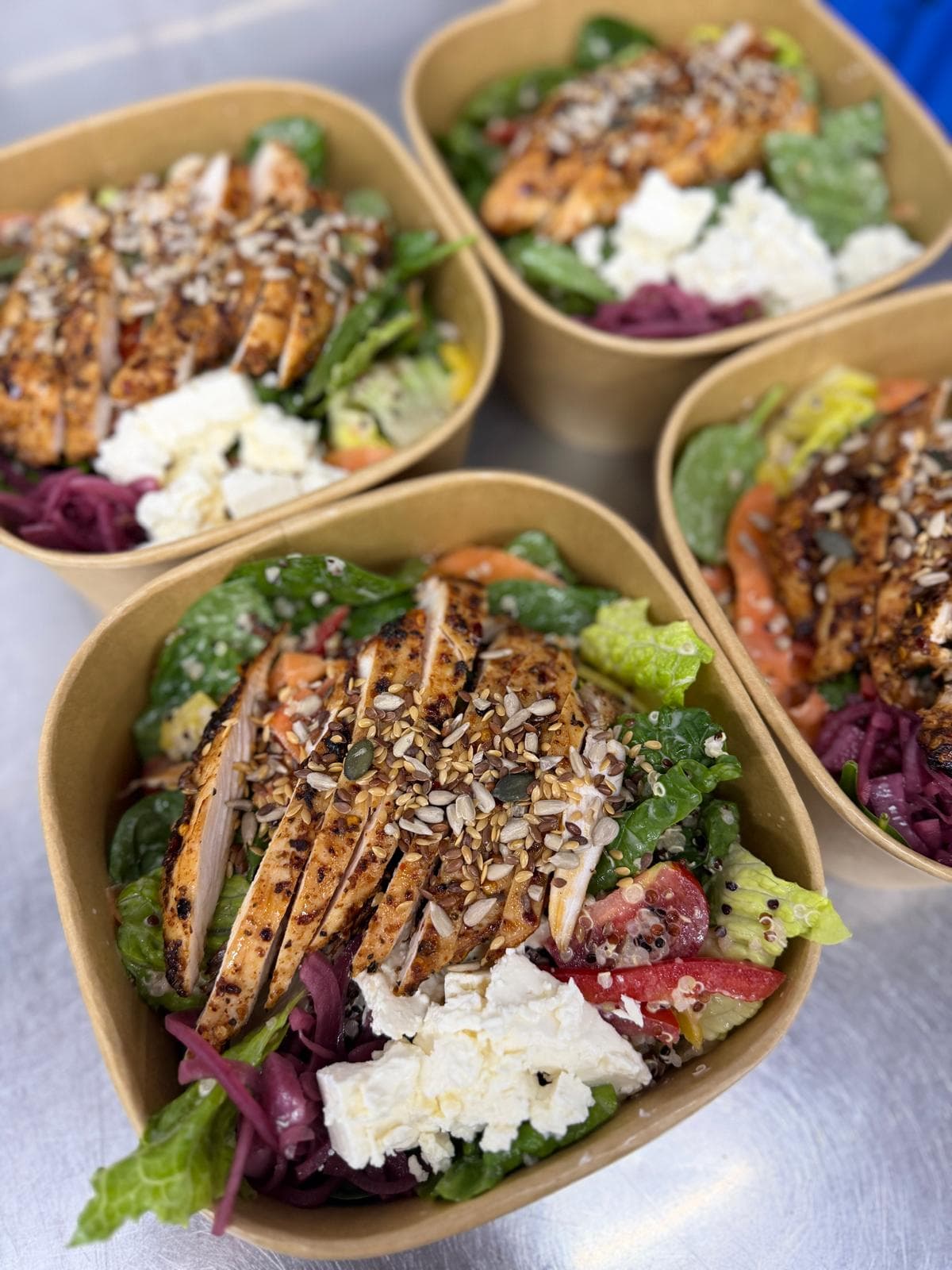 Chicken salad bowls with feta and red cabbage